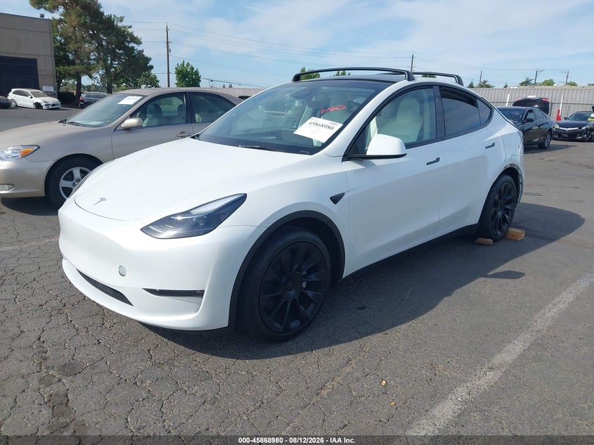2024 Tesla Model y VIN 7SAYGAEE7RF189871 IAAI salvage auction — REAR END, Wait Title, sold $11,300 on 2026-09-02 (photo 2)
