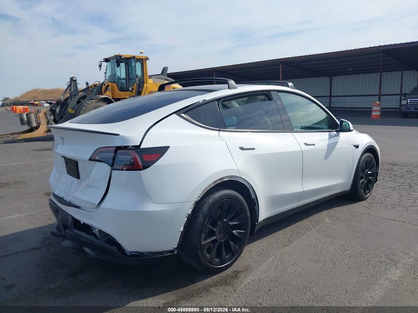 2024 Tesla Model y VIN 7SAYGAEE7RF189871 IAAI salvage auction — REAR END, Wait Title, sold $11,300 on 2026-09-02 (photo 4)
