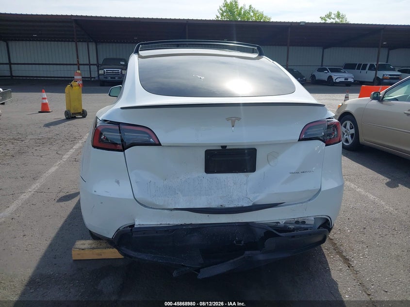 2024 Tesla Model y VIN 7SAYGAEE7RF189871 IAAI salvage auction — REAR END, Wait Title, sold $11,300 on 2026-09-02 (photo 6)
