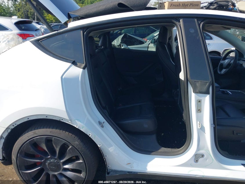 2022 Tesla Model y VIN 7SAYGDEF4NF309033 IAAI salvage auction — SIDE, Wait Title, sold $12,400 on 2026-10-07 (photo 8)