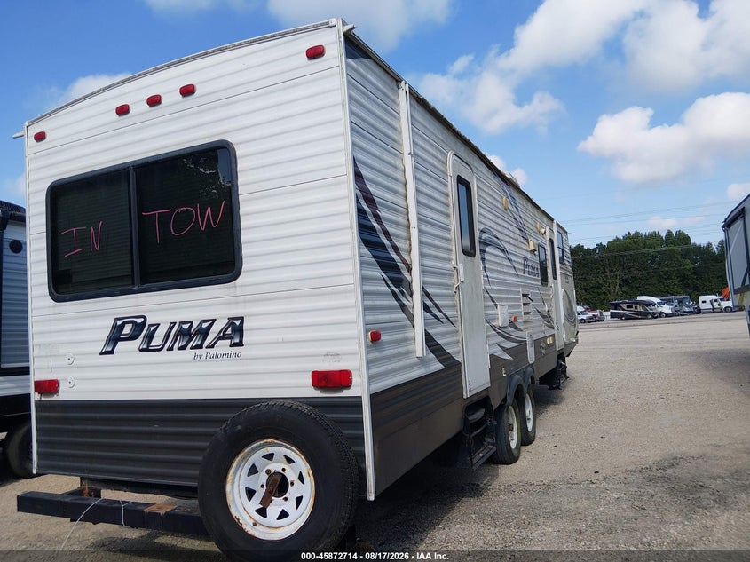 2014 Palomino Puma VIN 4X4TPUF28EP049898 IAAI salvage auction — STORM DAMAGE, Salvage (Louisiana), sold $25 on 2026-09-16 (photo 4)