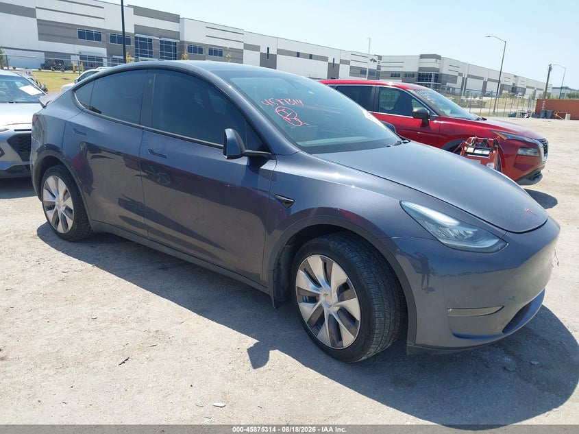 2023 Tesla Model y VIN 7SAYGDEE3PA040904 — IAAI salvage auction photo