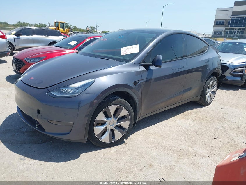 2023 Tesla Model y VIN 7SAYGDEE3PA040904 IAAI salvage auction — REAR END, Salvage (Texas), sold $12,700 on 2026-08-28 (photo 2)