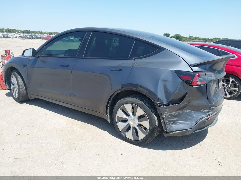 2023 Tesla Model y VIN 7SAYGDEE3PA040904 IAAI salvage auction — REAR END, Salvage (Texas), sold $12,700 on 2026-08-28 (photo 3)
