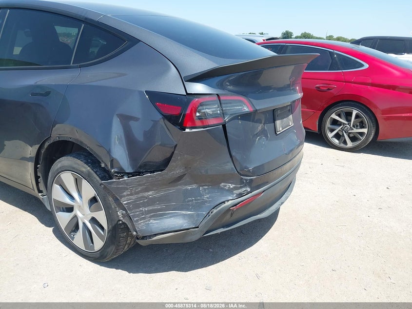 2023 Tesla Model y VIN 7SAYGDEE3PA040904 IAAI salvage auction — REAR END, Salvage (Texas), sold $12,700 on 2026-08-28 (photo 6)