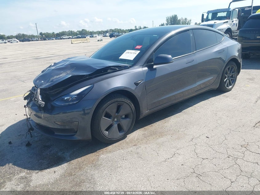 2022 Tesla Model 3 VIN 5YJ3E1EA3NF341696 IAAI salvage auction — FRONT & REAR, Wait Title, sold $5,900 on 2026-10-18 (photo 2)