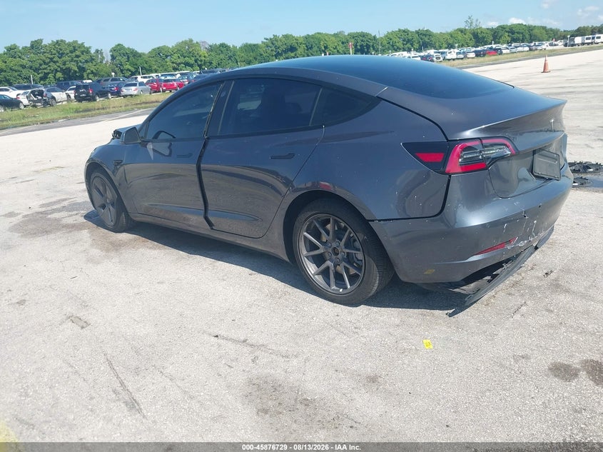 2022 Tesla Model 3 VIN 5YJ3E1EA3NF341696 IAAI salvage auction — FRONT & REAR, Wait Title, sold $5,900 on 2026-10-18 (photo 3)