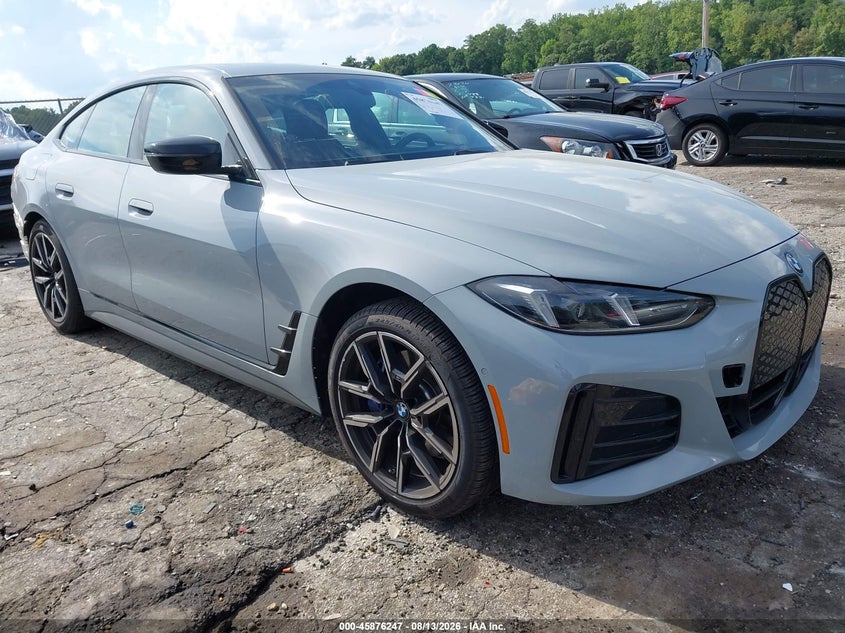 2025 BMW i4 VIN WBY23HD05SFU86957 — IAAI salvage auction photo