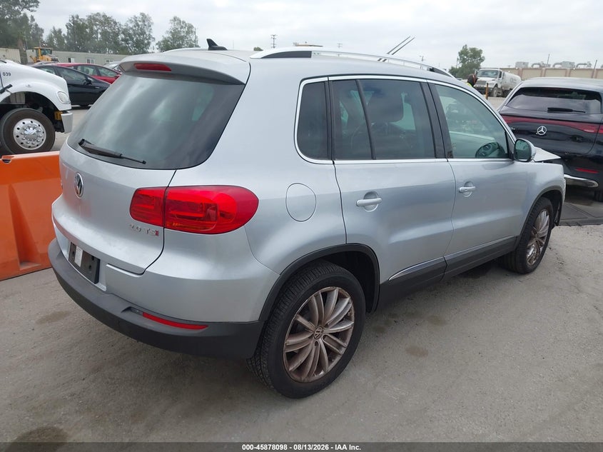 2014 Volkswagen Tiguan VIN WVGAV3AX7EW591723 IAAI salvage auction — UNKNOWN, Clear - Dealer Only (California), sold $2,000 on 2026-08-19 (photo 4)