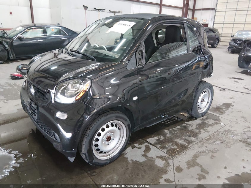 2019 Smart Fortwo VIN WMEFJ9BAXKK370687 IAAI salvage auction — REAR END, Salvage Title, sold $2,250 on 2026-09-24 (photo 2)
