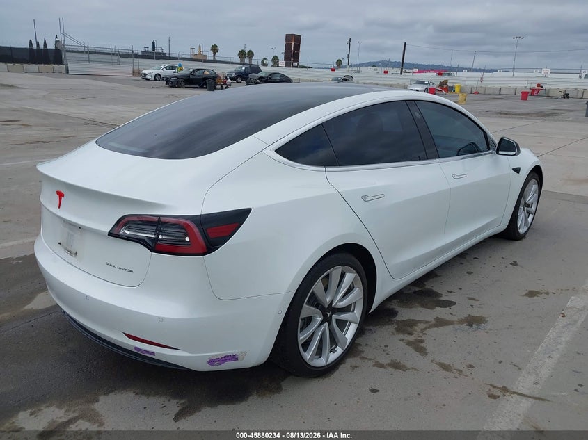 2018 Tesla Model 3 VIN 5YJ3E1EB0JF131432 IAAI salvage auction — NORMAL WEAR, Clear - Dealer Only (California), sold $3,450 on 2026-08-22 (photo 4)