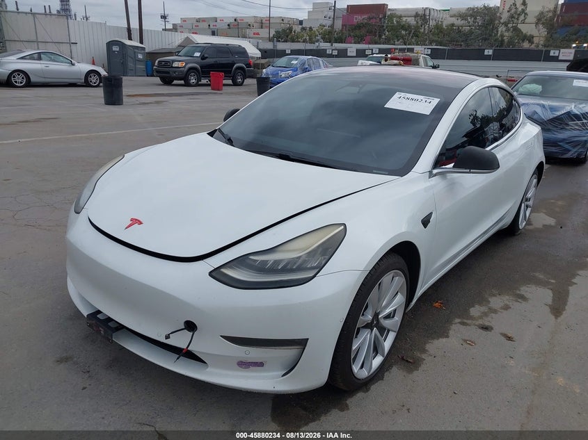 2018 Tesla Model 3 VIN 5YJ3E1EB0JF131432 IAAI salvage auction — NORMAL WEAR, Clear - Dealer Only (California), sold $3,450 on 2026-08-22 (photo 6)