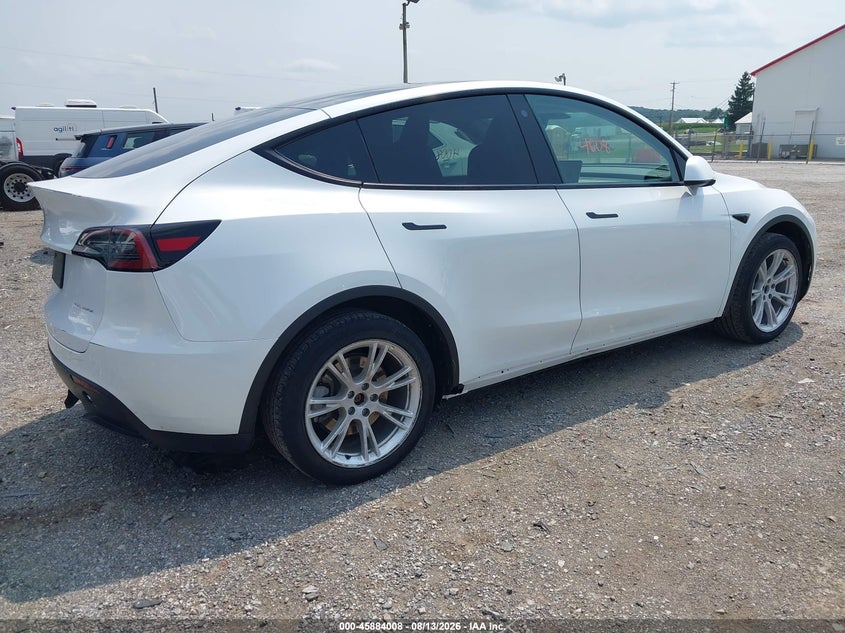 2023 Tesla Model y VIN 7SAYGDEE7PF703555 IAAI salvage auction — REAR END, Salvage (Pennsylvania), sold $16,650 on 2026-09-03 (photo 4)
