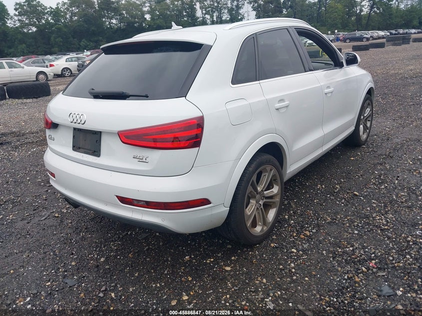 2015 Audi Q3 VIN WA1EFCFS4FR010415 IAAI salvage auction — NORMAL WEAR, Clear (New York), sold $2,400 on 2026-09-20 (photo 4)