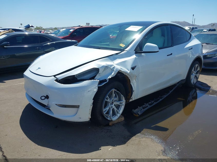 2023 Tesla Model y VIN 7SAYGDEEXPF638927 IAAI salvage auction — LEFT FRONT, Salvage (Arizona), sold $9,700 on 2026-08-30 (photo 2)