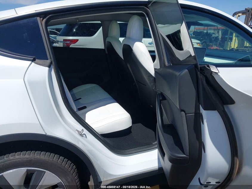 2023 Tesla Model y VIN 7SAYGDEEXPF638927 IAAI salvage auction — LEFT FRONT, Salvage (Arizona), sold $9,700 on 2026-08-30 (photo 8)