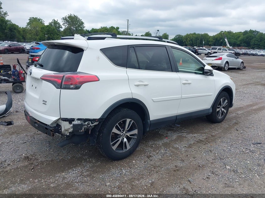 2018 Toyota RAV 4 VIN JTMRFREV7JD243121 IAAI salvage auction — Rear, Salvage, sold $8,800 on 2026-10-13 (photo 4)