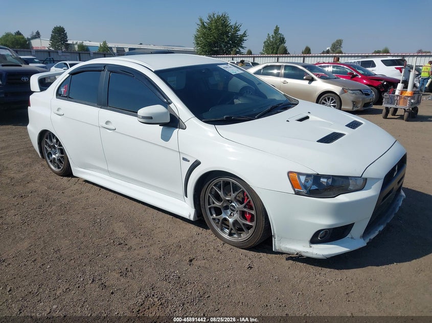 2015 Mitsubishi Lancer evolution VIN JA32W8FV2FU603959 — IAAI salvage auction photo
