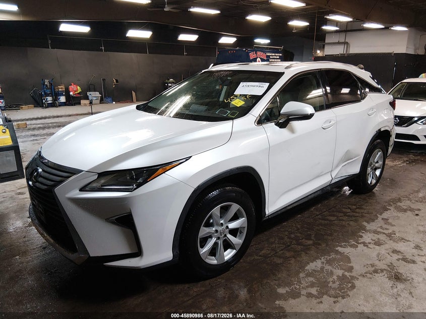 2016 Lexus Rx VIN 2T2BZMCA7GC040985 IAAI salvage auction — LEFT REAR, Mv-907A (New York), sold $18,175 on 2026-09-01 (photo 2)