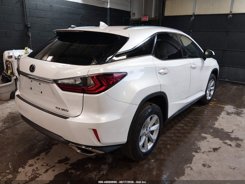 2016 Lexus Rx VIN 2T2BZMCA7GC040985 IAAI salvage auction — LEFT REAR, Mv-907A (New York), sold $18,175 on 2026-09-01 (photo 4)