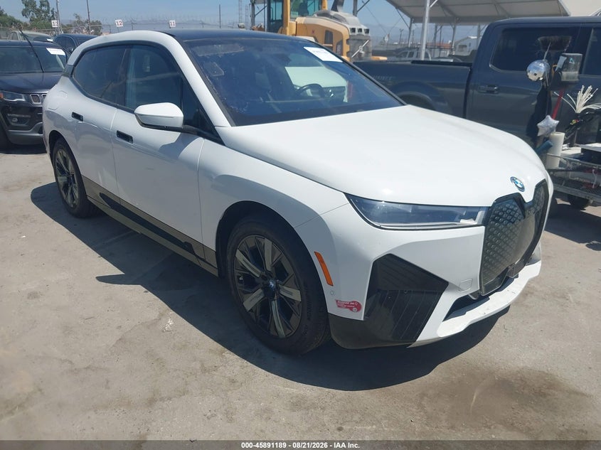 2023 BMW iX VIN WB523CF01PCM98271 — IAAI salvage auction photo