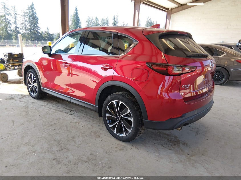2023 Mazda Cx-5 VIN JM3KFBEM8P0130625 IAAI salvage auction — SIDE, Wait Title, sold $8,700 on 2026-09-23 (photo 3)
