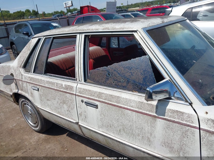 1985 Plymouth Caravelle VIN 1P3BJ46D3FC213779 IAAI salvage auction — NORMAL WEAR, Clear (Oklahoma), sold $150 on 2026-09-02 (photo 6)