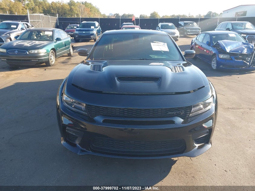 2021 Dodge Charger VIN 2C3CDXL93MH660916 COPART salvage auction — Theft, Salvage Title, sold $57,025 on 2023-12-20 (photo 6)