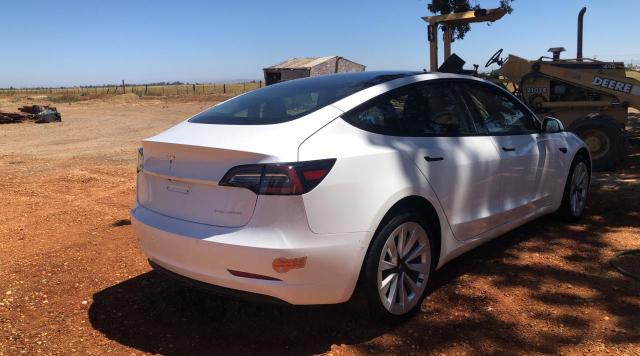 2022 Tesla Model 3 VIN 5YJ3E1EB8NF137548 COPART salvage auction — Unknown, Salvage, sold $12,100 on 2023-08-16 (photo 4)