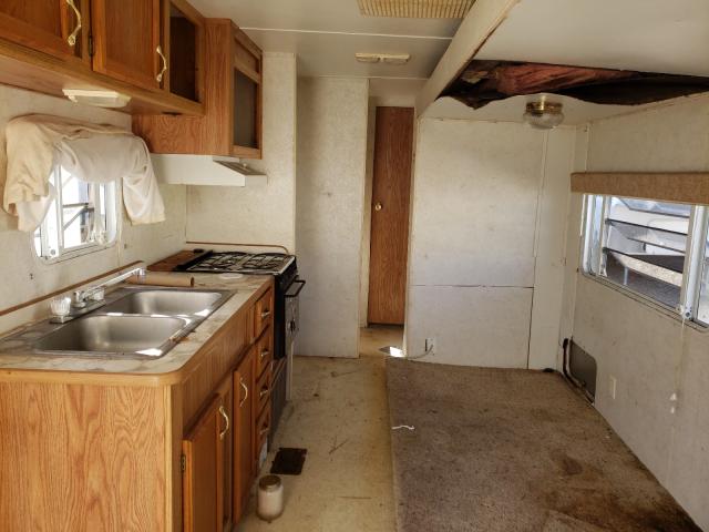 2001 Gulf stream VIN 1NL1CTP2911044105 COPART salvage auction — WATER/FLOOD, TX - SALVAGE TITLE-FLOOD DAMAGE, sold $25 on 2026-10-01 (photo 7)
