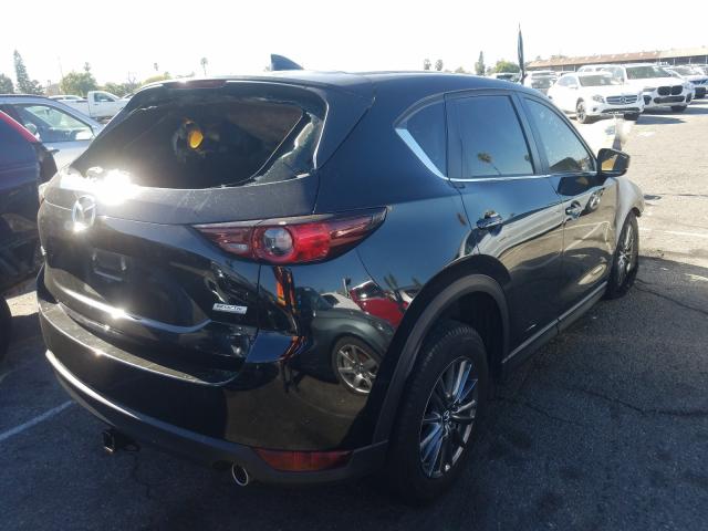 2018 Mazda Cx-5 VIN JM3KFABM0J1458752 COPART salvage auction — BURN, Id - Salvage Certificate Of Title, sold $300 on 2026-07-31 (photo 4)