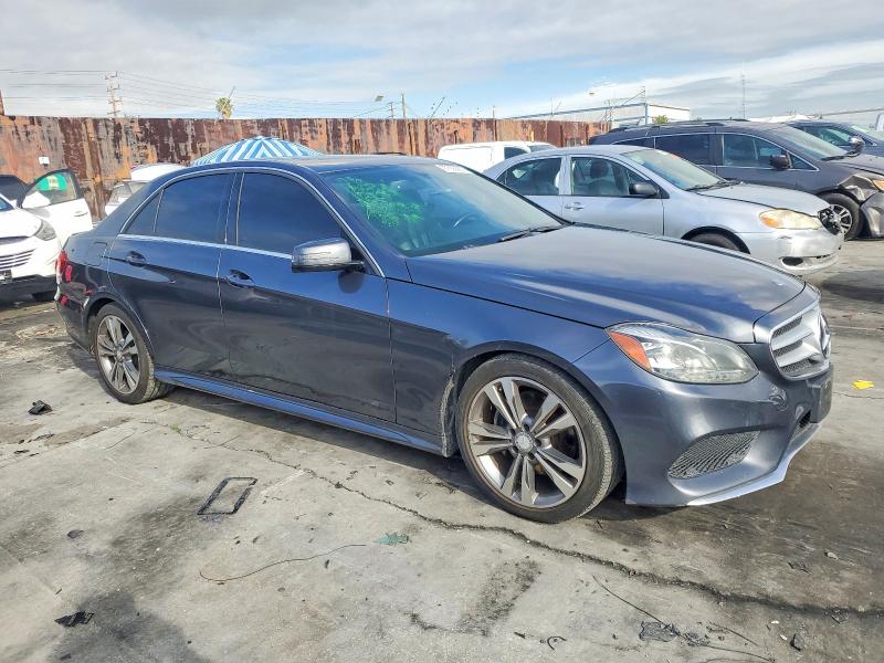 2015 Mercedes-benz E-klasse VIN WDDHF5KB0FB091352 COPART salvage auction — NORMAL WEAR, CA - SALVAGE CERTIFICATE, sold $200 on 2026-08-14 (photo 4)
