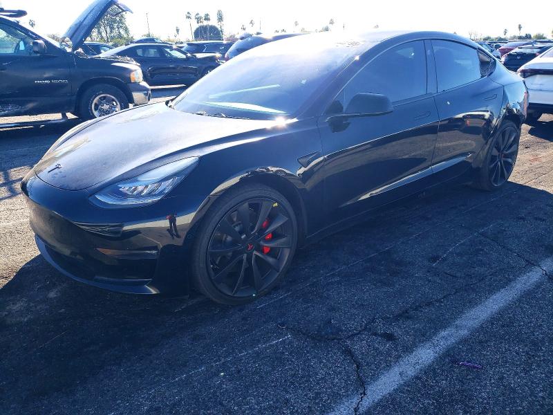 2019 Tesla Model 3 VIN 5YJ3E1EB2KF440787 — COPART salvage auction photo
