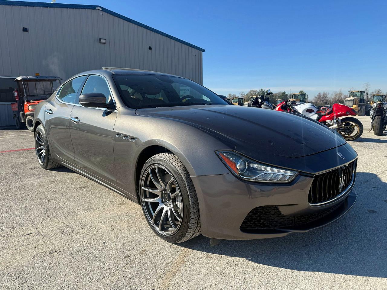 2017 Maserati Ghibli VIN ZAM57XSA9H1206127 COPART salvage auction — Damage History, TX - CERT OF TITLE-REBUILT SALVAGE (P), sold $30,500 on 2026-02-27 (photo 1)