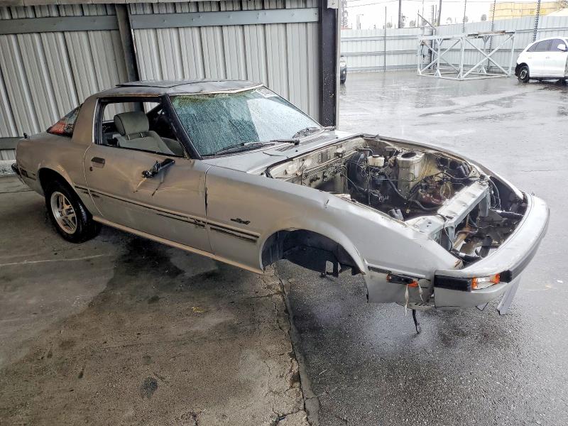 1984 Mazda Rx-7 VIN JM1FB3319E0807750 COPART salvage auction — STRIPPED, CA - DIS/DLR/EXP ONLY CLEAN TITLE, sold $225 on 2026-07-20 (photo 4)