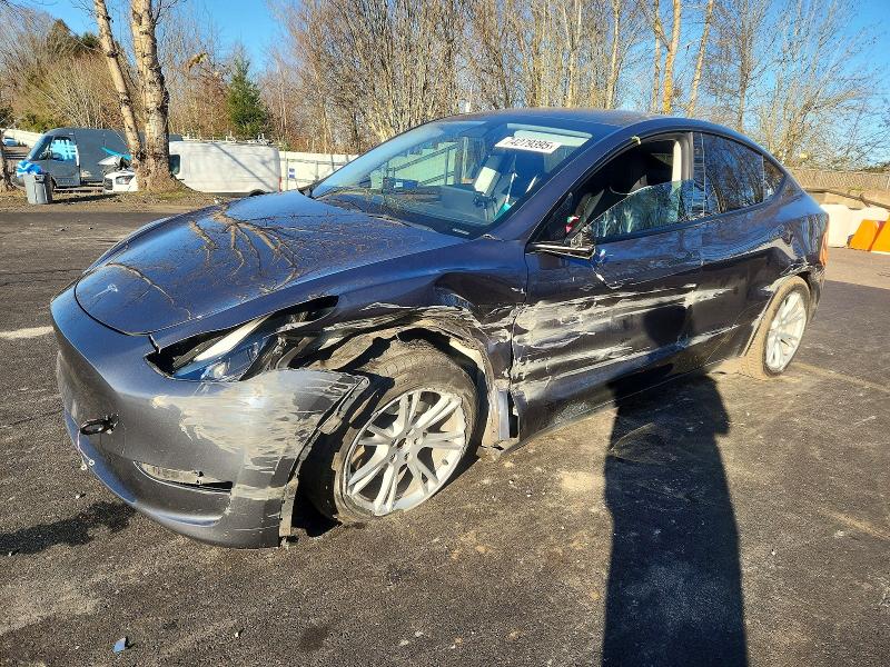 2023 Tesla Model y VIN 7SAYGAEE7PF771059 COPART salvage auction — FRONT END, Or - Salvage Title Certificate, sold $8,200 on 2026-07-22 (photo 1)