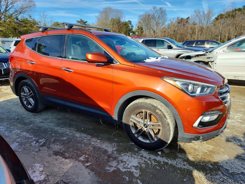 2017 Hyundai Santa fe VIN 5XYZUDLB9HG411418 COPART salvage auction — HAIL, Md - Cert Of Salvage < 75% Damage, sold $2,250 on 2026-07-07 (photo 4)