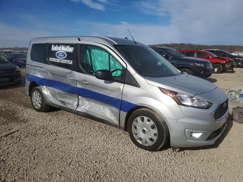 2022 Ford Transit connect VIN NM0GS9F21N1541787 COPART salvage auction — SIDE, Fl - Cert Of Title Slvg Rebuildable, sold $6,350 on 2026-07-10 (photo 4)