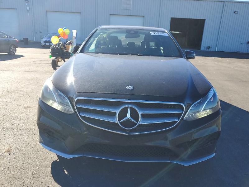 2014 Mercedes-benz E-klasse VIN WDDHF5KB8EA996829 COPART salvage auction — SIDE, Fl - Cert Of Title Slvg Rebuildable, sold $2,400 on 2026-07-13 (photo 5)