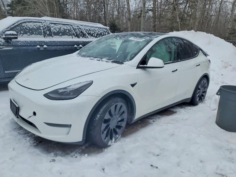 2022 Tesla Model y VIN 7SAYGDEF4NF515601 COPART salvage auction — REAR END, ON - PERMIT SALVAGE, sold $12,300 on 2026-07-16 (photo 1)