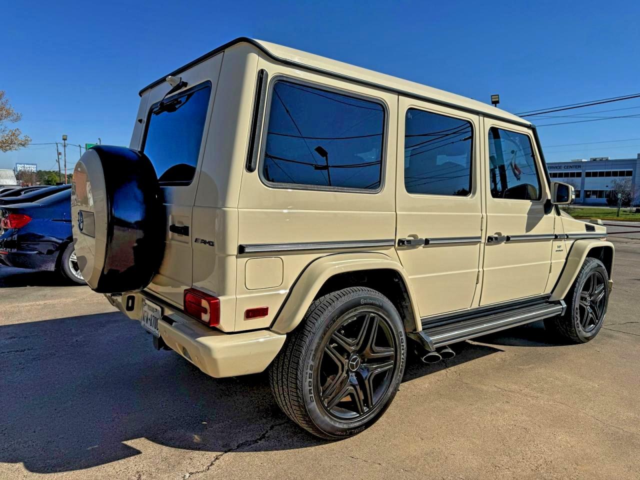 2015 Mercedes-benz G-class VIN WDCYC7DF9FX234021 COPART salvage auction — Minor Dent/Scratches, TX - CERT OF TITLE-REBUILT SALVAGE (P), sold $72,000 on 2026-03-03 (photo 4)