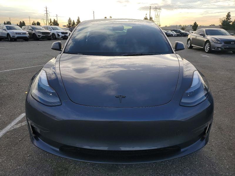 2023 Tesla Model 3 VIN 5YJ3E1EB6PF711079 COPART salvage auction — SIDE, Ca - Salvage Certificate, sold $6,700 on 2026-07-28 (photo 5)
