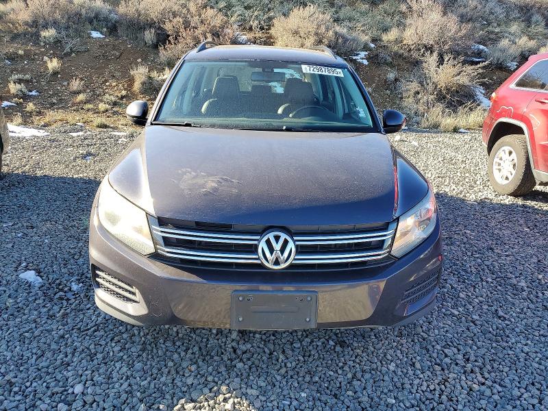 2016 Volkswagen Tiguan VIN WVGBV7AX3GW593869 COPART salvage auction — MINOR DENT/SCRATCHES, Nv - Certificate Of Title, sold $850 on 2026-07-23 (photo 5)