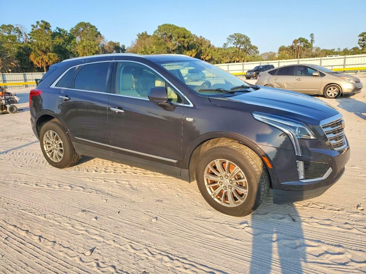 2017 Cadillac XT5 VIN 1GYKNDRSXHZ267282 COPART salvage auction — Water/Flood, PA - CERT OF SALVAGE-W=FLOOD VEH, sold $4,750 on 2026-06-25 (photo 4)