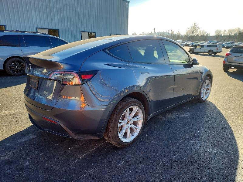2023 Tesla Model y VIN 7SAYGAEE7PF771059 COPART salvage auction — FRONT END, Or - Salvage Title Certificate, sold $8,200 on 2026-07-22 (photo 3)
