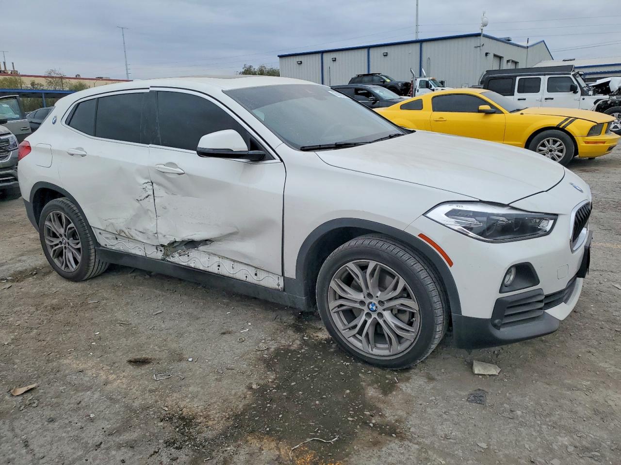 2019 BMW X2 VIN WBXYJ3C59KEP77150 COPART salvage auction — Side, NV - SALVAGE TITLE, sold $4,150 on 2026-06-30 (photo 4)
