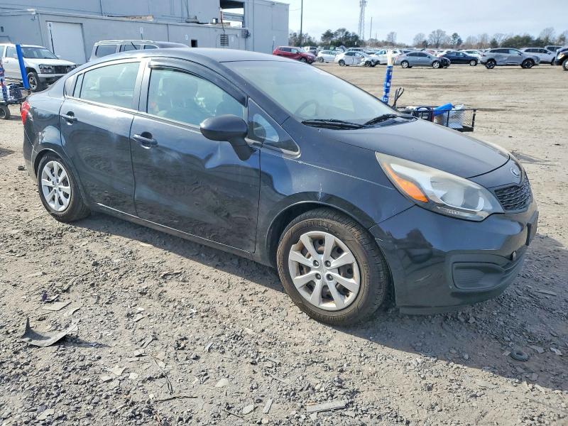 2014 Kia Rio VIN KNADM4A31E6340295 COPART salvage auction — SIDE, Id - Salvage Certificate Of Title, sold $500 on 2026-07-08 (photo 4)