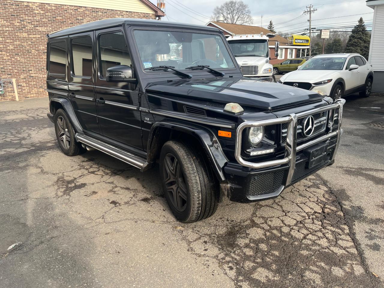 2017 Mercedes-benz G-class VIN WDCYC7DF6HX275774 COPART salvage auction — Minor Dent/Scratches, MA - CERTIFICATE OF TITLE (P), sold $47,000 on 2026-02-09 (photo 4)