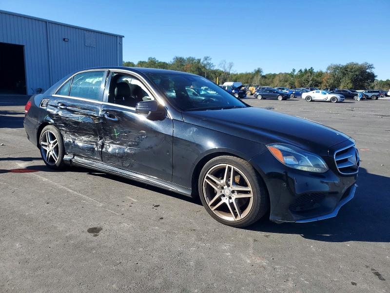 2014 Mercedes-benz E-klasse VIN WDDHF5KB8EA996829 COPART salvage auction — SIDE, Fl - Cert Of Title Slvg Rebuildable, sold $2,400 on 2026-07-13 (photo 4)