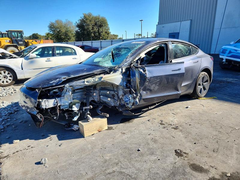 2023 Tesla Model 3 VIN 5YJ3E1EA6PF448020 COPART salvage auction — SIDE, Fl - Cert Of Title Slvg Rebuildable, sold $3,200 on 2026-07-06 (photo 1)